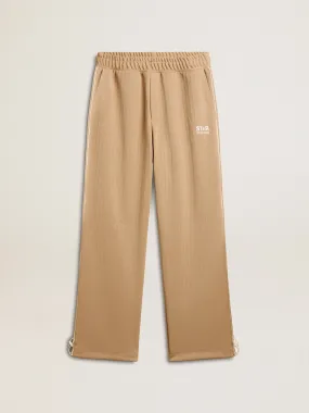 Pantalón jogger de hombre de color beige claro con logotipo blanco