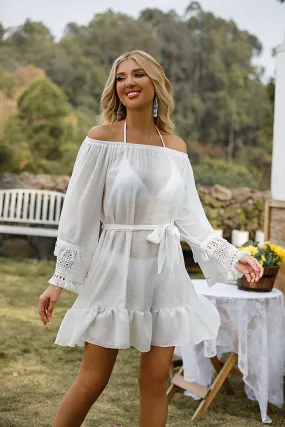 Vestido blanco de playa con mangas anchas